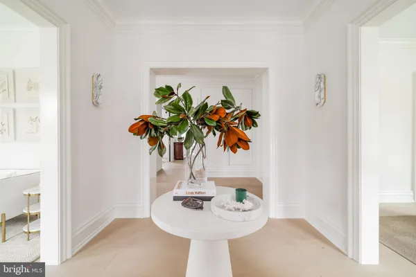 a vase of flowers sitting on a table