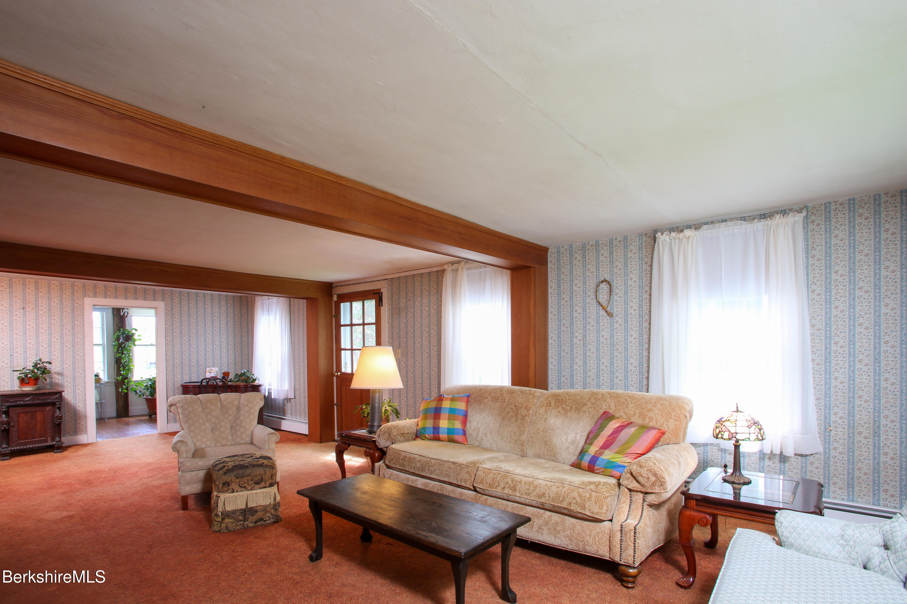 31 West Oxbow Road Charlemont, MA 01370 - Photo 12 of 39 a living room with furniture and a potted plant