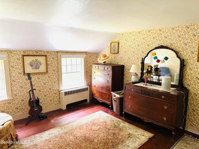 a view of a house with a yard and plants