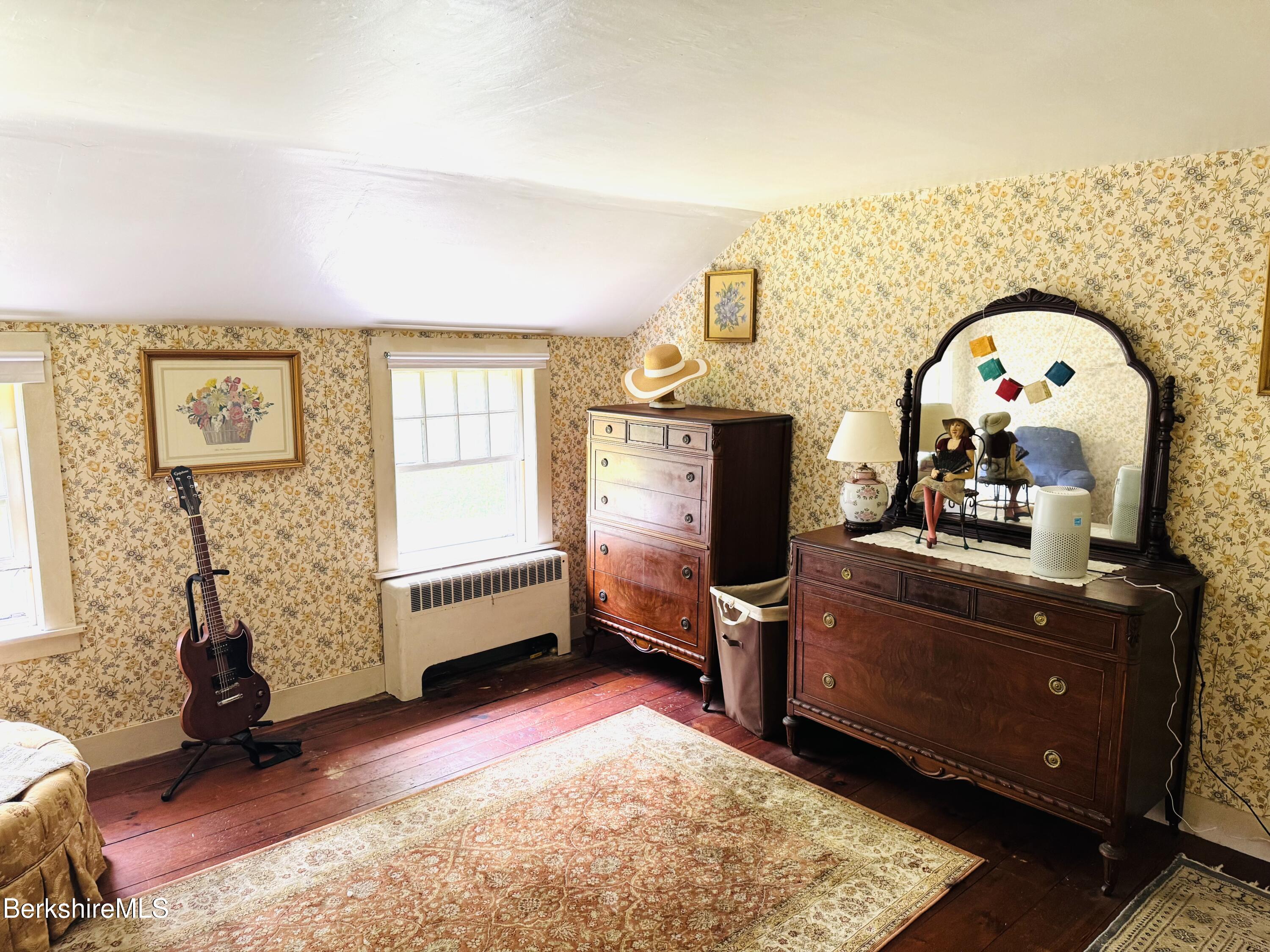31 West Oxbow Road Charlemont, MA 01370 - Photo 20 of 39 a living room with furniture and a flat screen tv