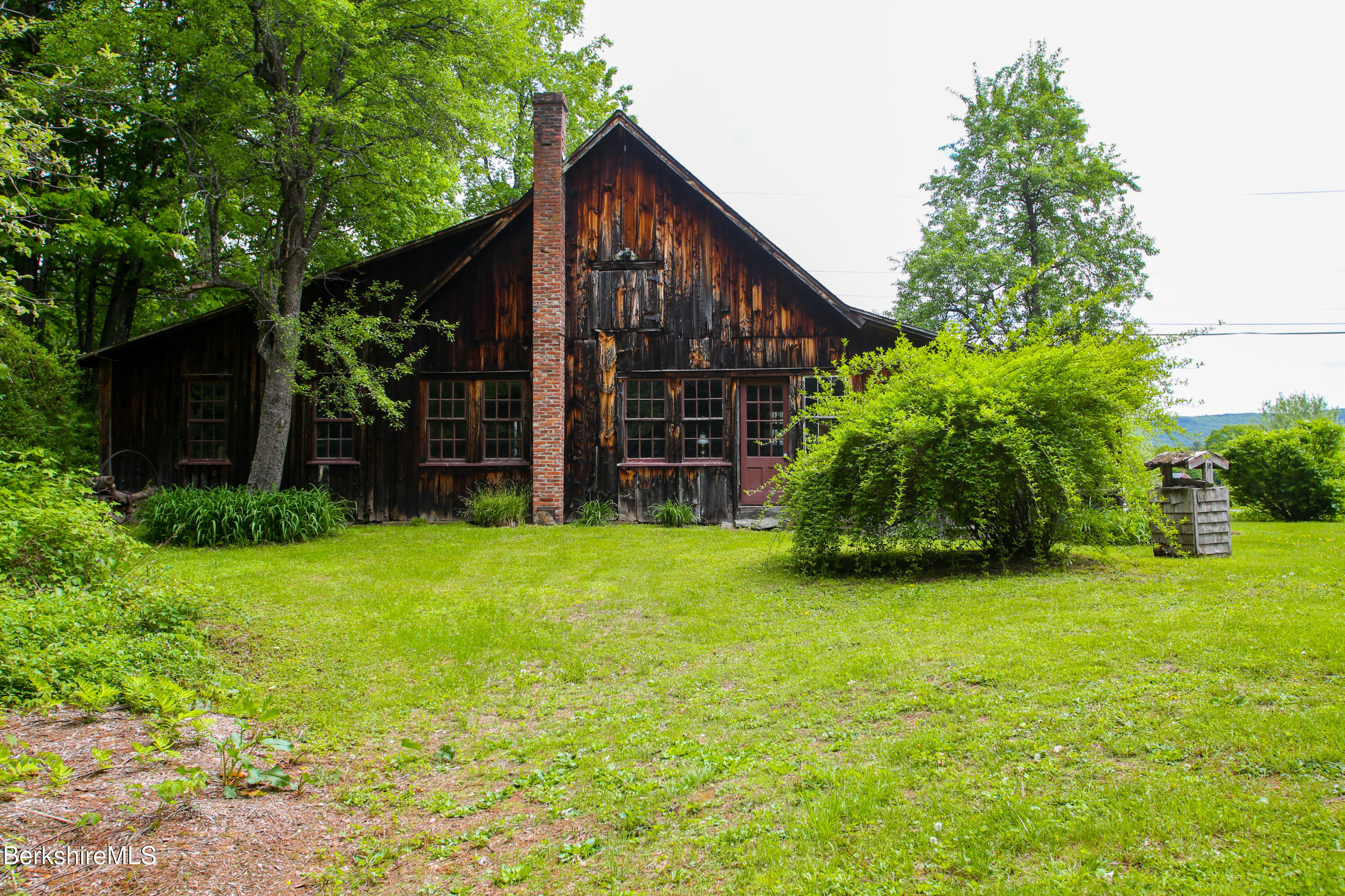 31 West Oxbow Road Charlemont, MA 01370 - Photo 5 of 39 a view of a house with backyard and garden