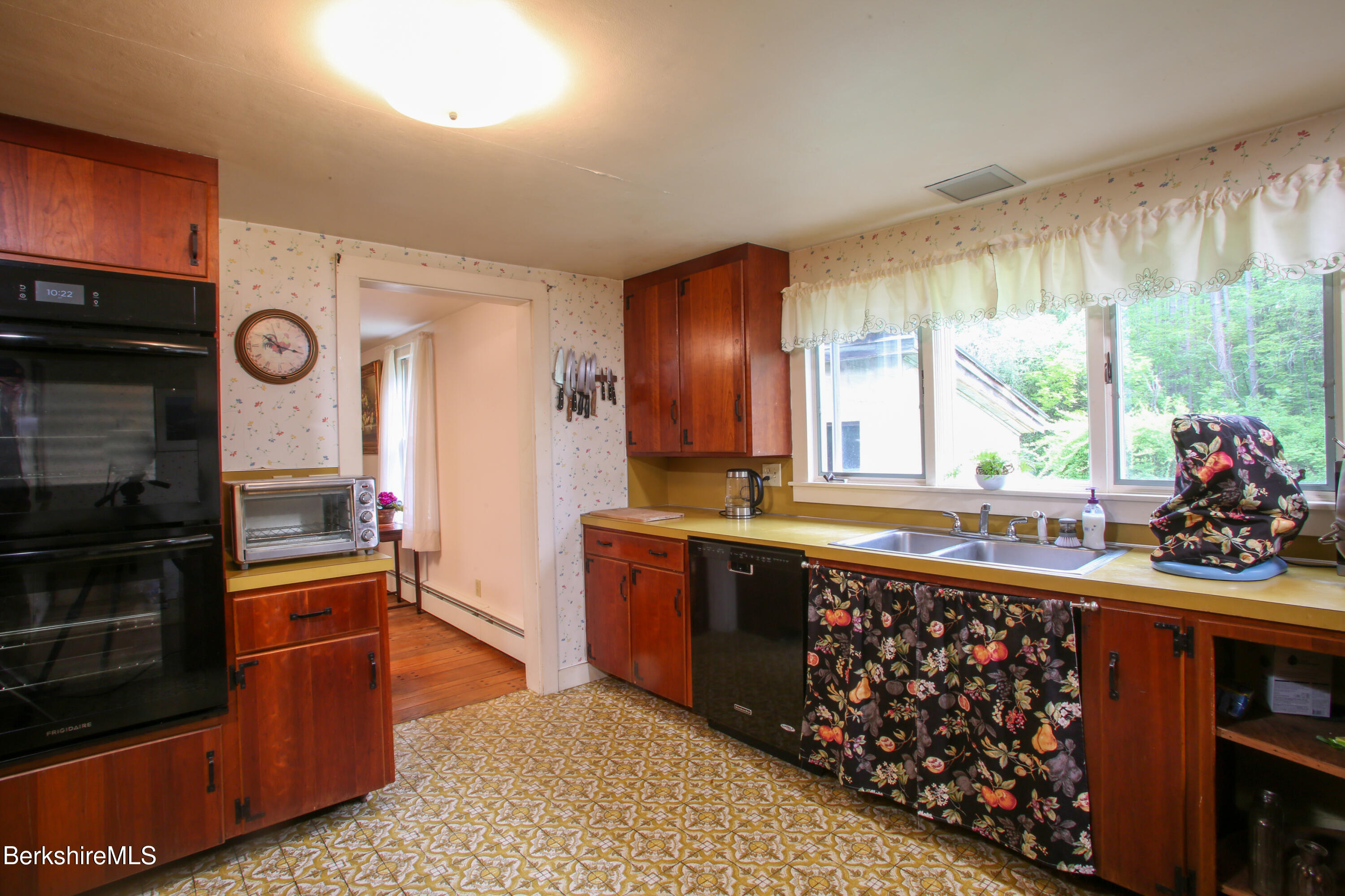 31 West Oxbow Road Charlemont, MA 01370 - Photo 9 of 39 a kitchen with stainless steel appliances granite countertop a stove a sink and a refrigerator
