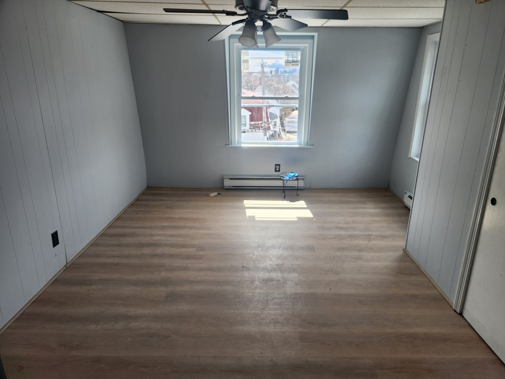 51 Everett Street, Unit 3 Everett, MA 02149 - Photo 1 of 4 a view of an empty room and window