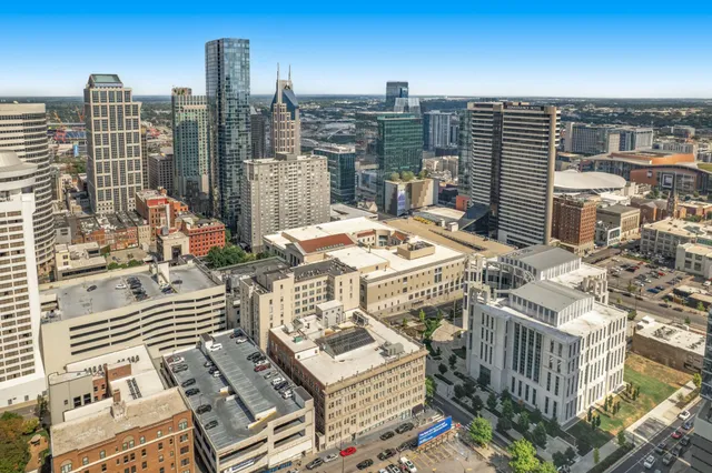 a view of city with tall buildings