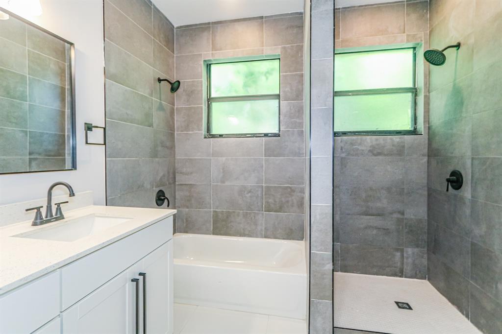 22808 Southwest 89th Path Cutler Bay, FL 33190 - Photo 20 of 35 a bathroom with a sink and a shower