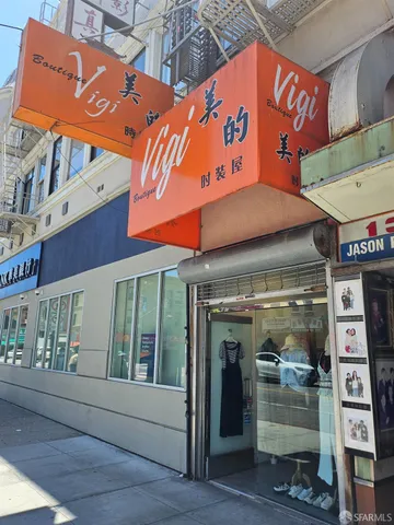 an outdoor space with a furniture