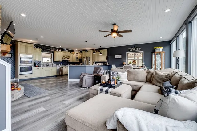 a view of a dining room with furniture window and outside view