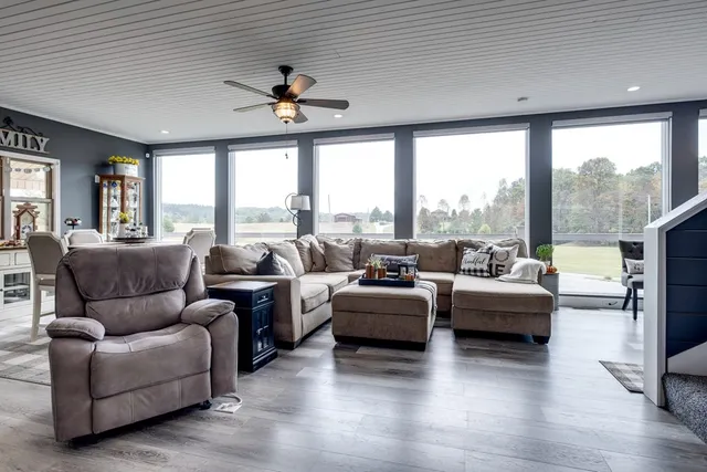a kitchen with stainless steel appliances granite countertop a sink and cabinets