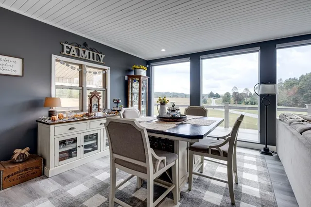a kitchen with granite countertop appliances cabinets and a sink