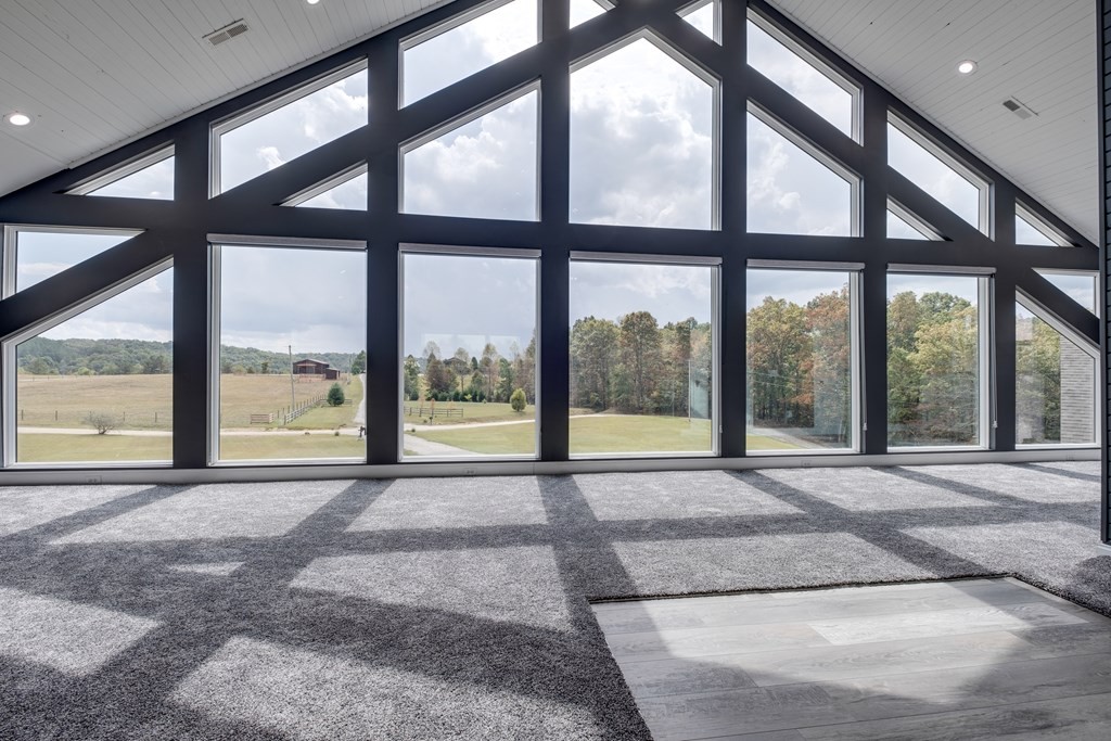 4700 Honey Creek Loop Road Allardt, TN 38504 - Photo 2 of 70 a view of an empty room with a large window