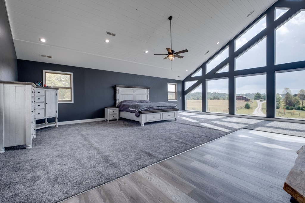 4700 Honey Creek Loop Road Allardt, TN 38504 - Photo 27 of 70 a living room with furniture and a flat screen tv