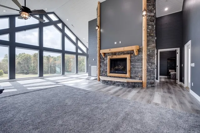 a kitchen with stainless steel appliances granite countertop a refrigerator stove and microwave