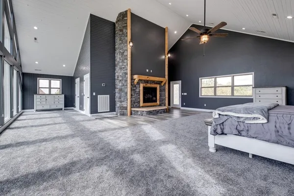 a room with furniture and a flat screen tv
