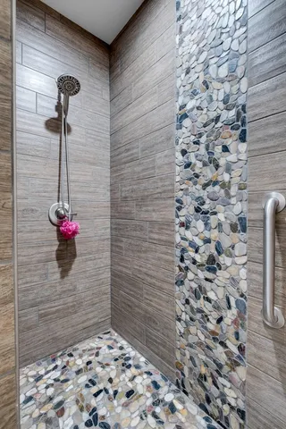 a view of a house with pool and chairs