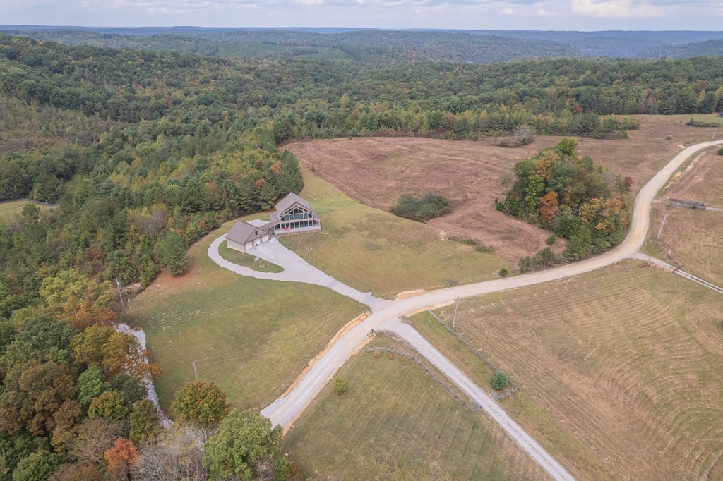 4700 Honey Creek Loop Road Allardt, TN 38504 - Photo 68 of 70 an aerial view of a house with a yard