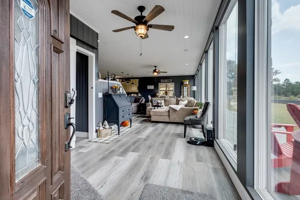 a view of a dining room with furniture window and outside view