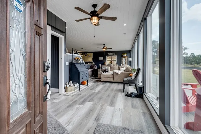 a view of a dining room with furniture window and outside view