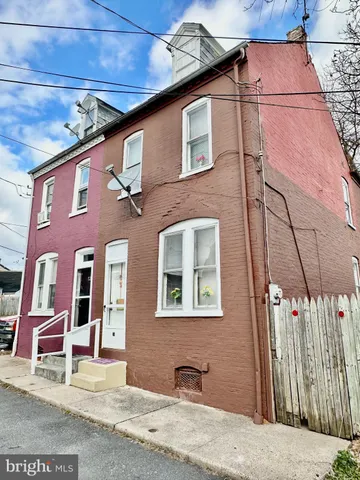 a front view of a house with a garage