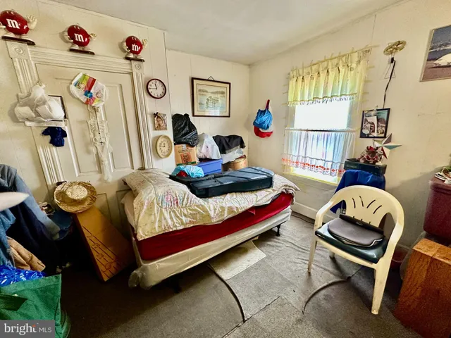 a living room filled with furniture and a table
