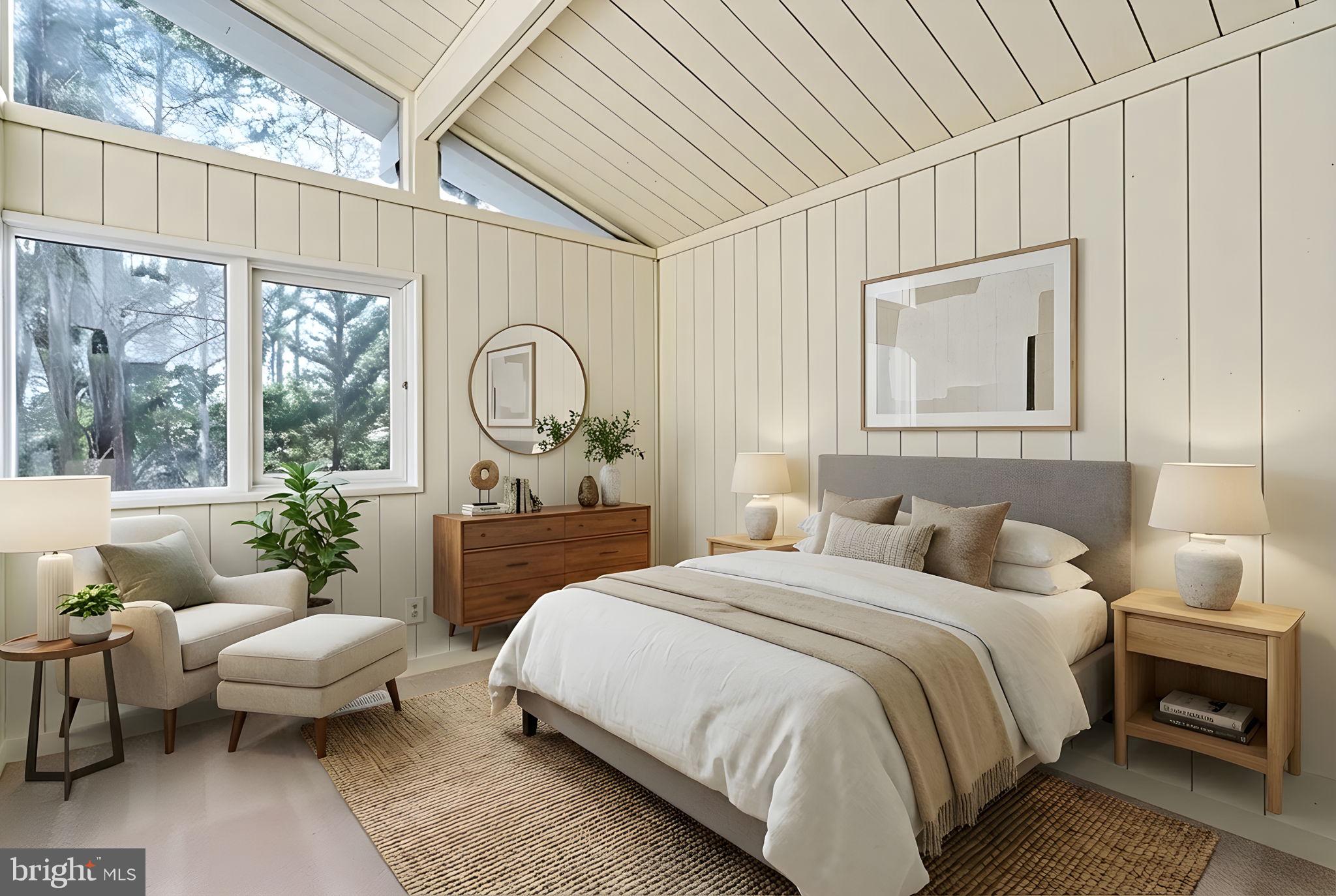 28 Tanglewood Road Palmyra, VA 22963 - Photo 11 of 44 a spacious bedroom with a bed a table and large window with outer view