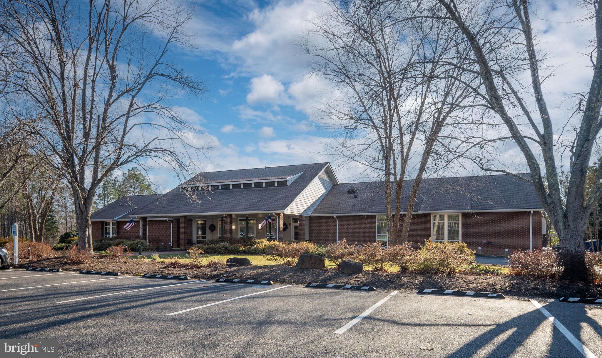 28 Tanglewood Road Palmyra, VA 22963 - Photo 24 of 44 a front view of a building with garden