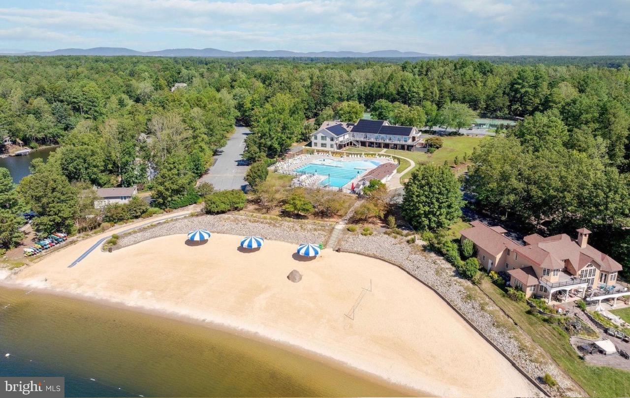 28 Tanglewood Road Palmyra, VA 22963 - Photo 41 of 44 a view of a swimming pool and trees in the background
