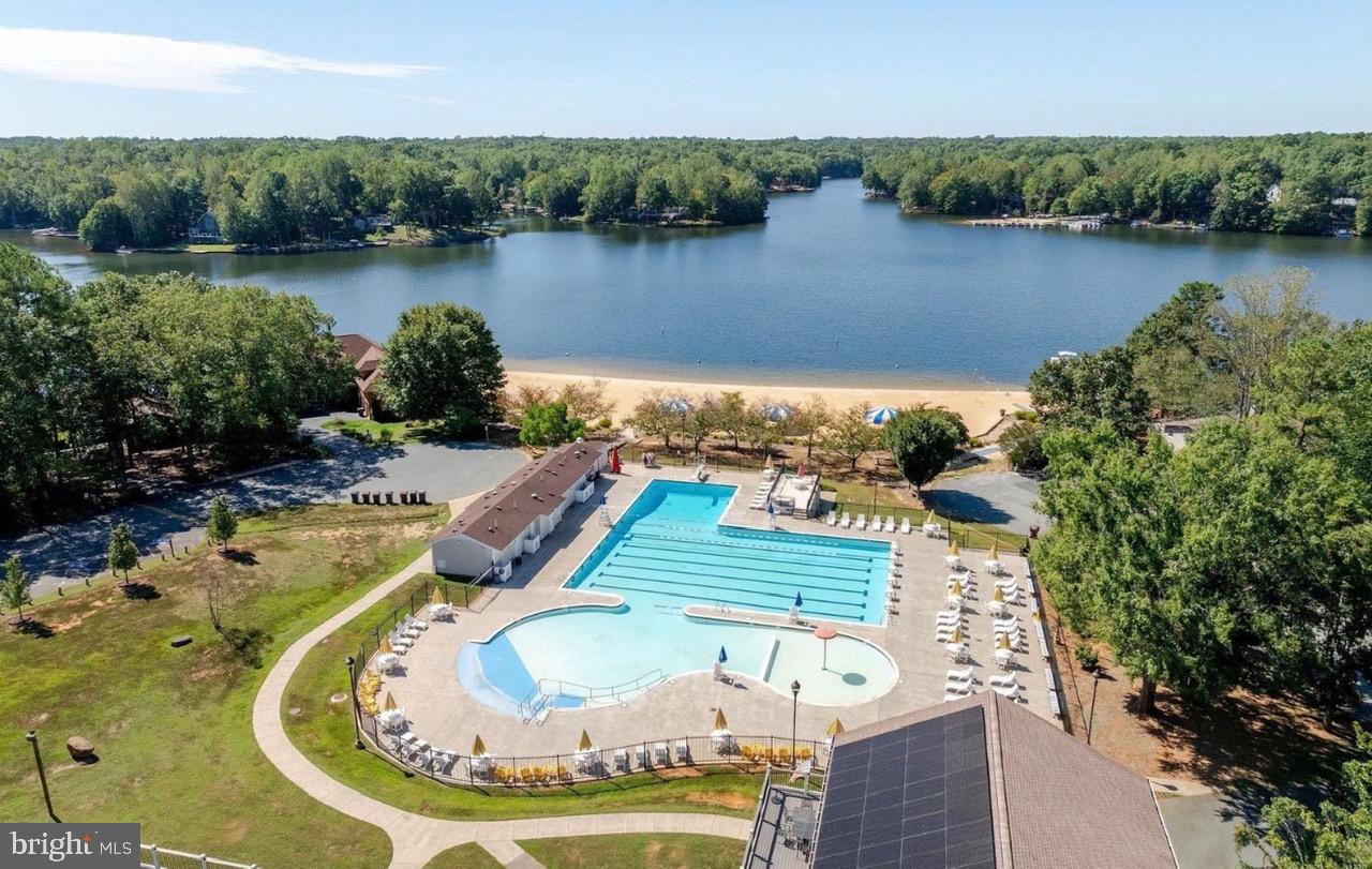 28 Tanglewood Road Palmyra, VA 22963 - Photo 42 of 44 an aerial view of a house with outdoor space and lake view