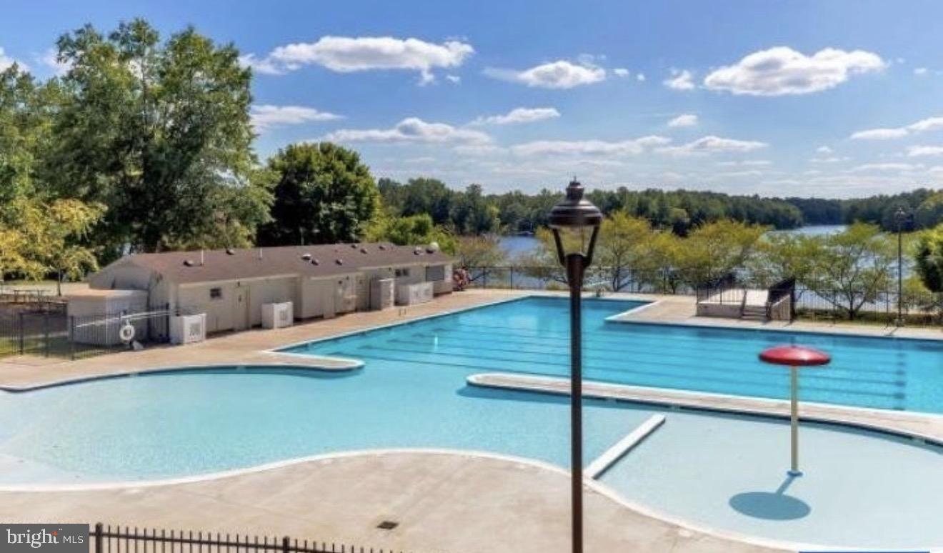 28 Tanglewood Road Palmyra, VA 22963 - Photo 44 of 44 a view of a swimming pool with a patio
