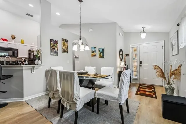 a view of a dining room with furniture