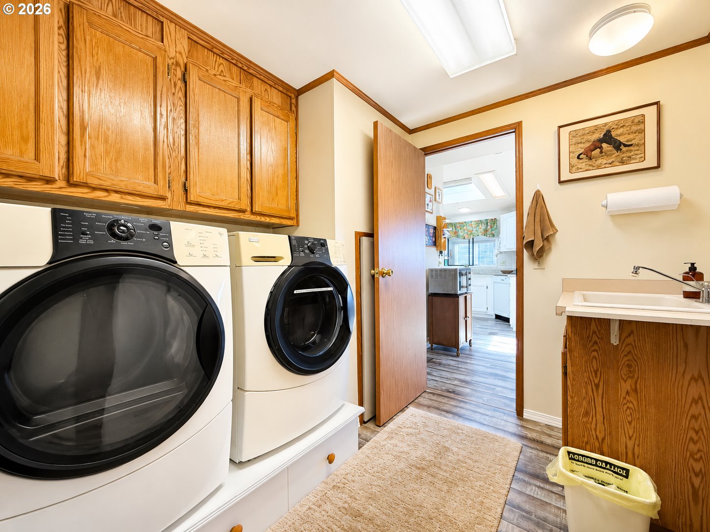 16219 Lower Harbor Road, Unit 16 Brookings, OR 97415 - Photo 26 of 40 a utility room with sink dryer and washer
