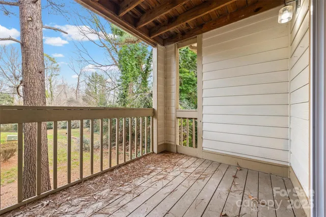 a view of outdoor space with wooden floor