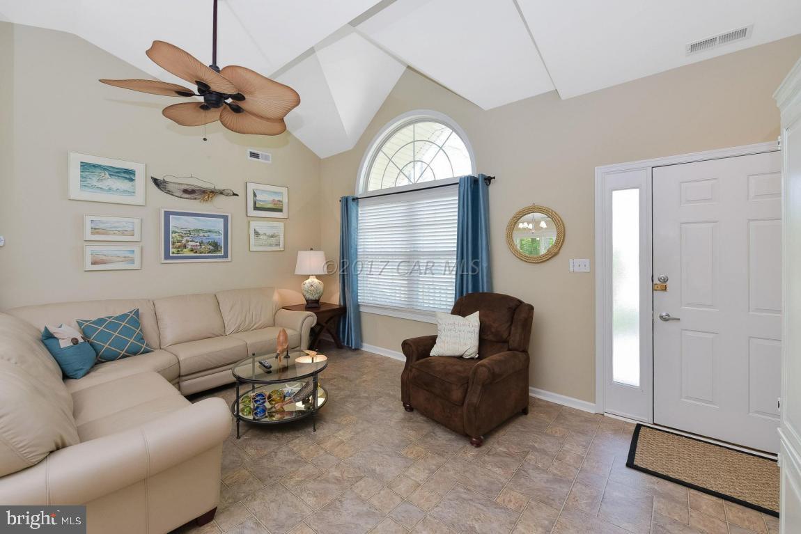 29 Watertown Road Ocean Pines, MD 21811 - Photo 2 of 49 a living room with furniture ceiling fan and a window