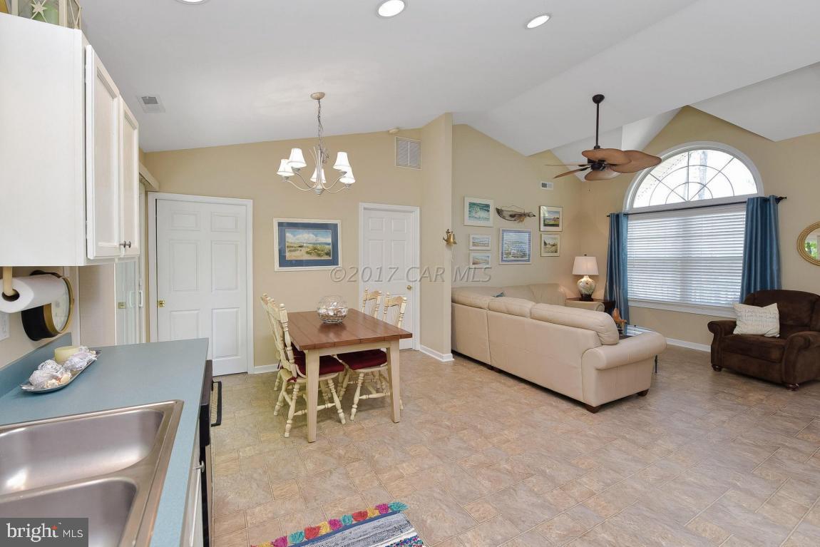 29 Watertown Road Ocean Pines, MD 21811 - Photo 12 of 49 a living room with furniture and a large window
