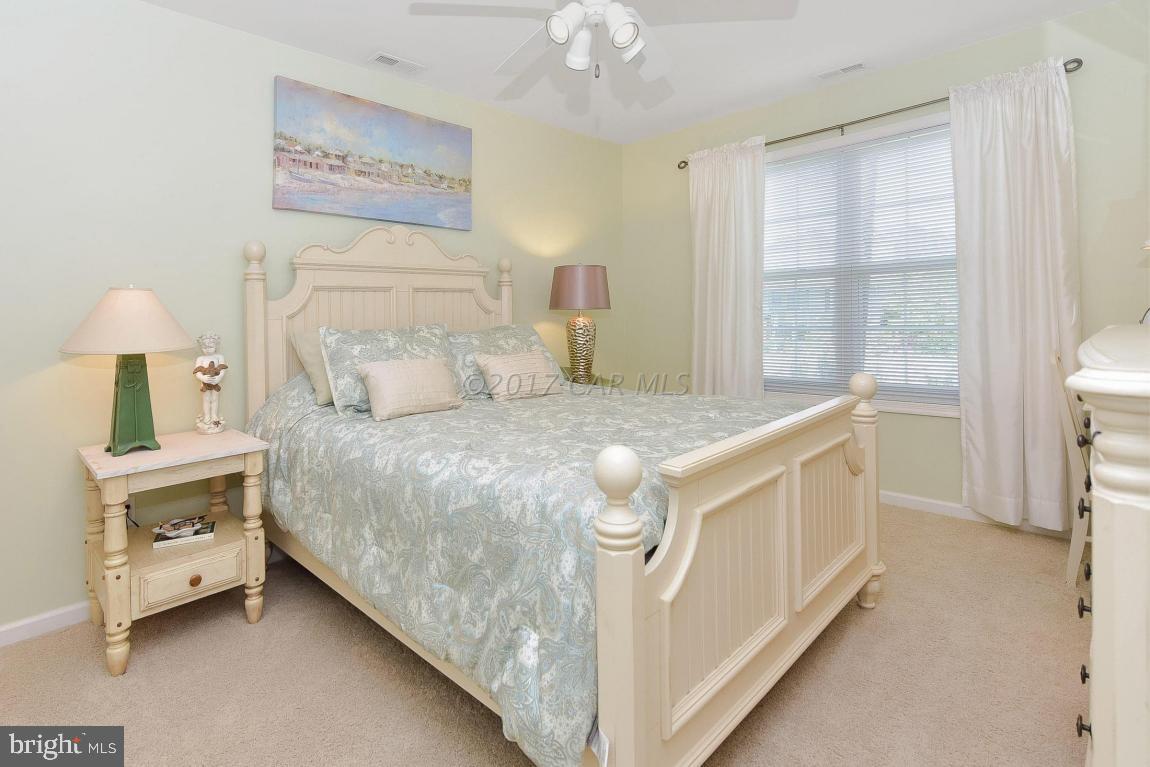 29 Watertown Road Ocean Pines, MD 21811 - Photo 17 of 49 a bed room with a bed and a window