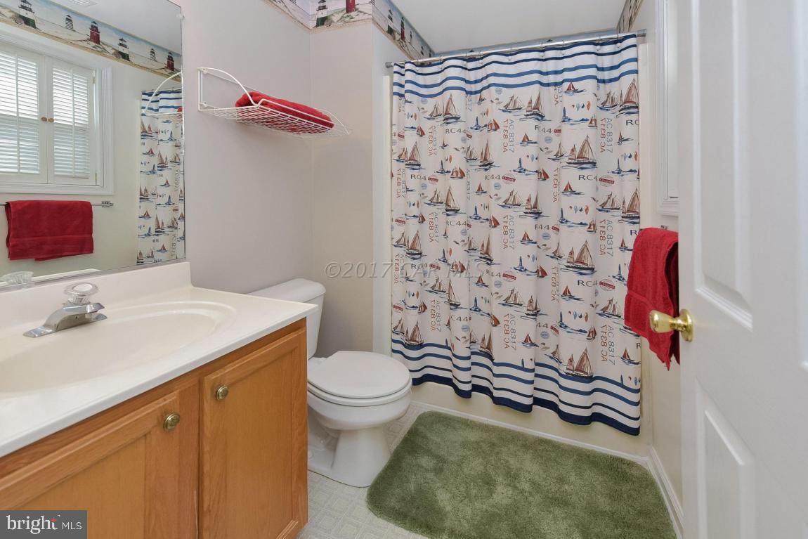 29 Watertown Road Ocean Pines, MD 21811 - Photo 21 of 49 a bathroom with a sink toilet and shower