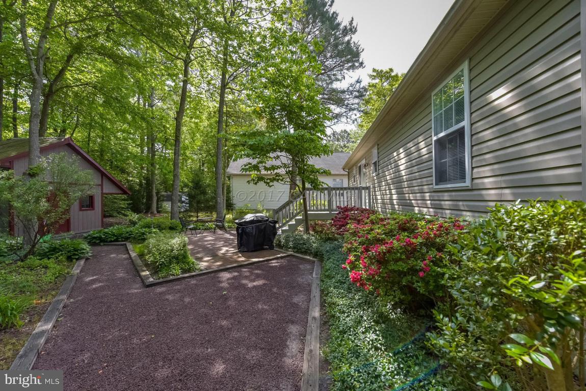 29 Watertown Road Ocean Pines, MD 21811 - Photo 39 of 49 a view of a backyard with garden