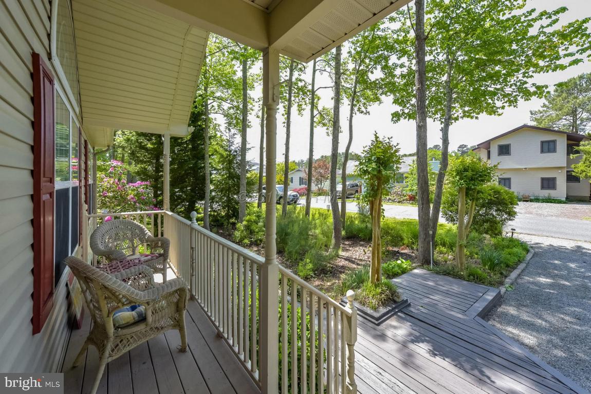 29 Watertown Road Ocean Pines, MD 21811 - Photo 42 of 49 a view of a balcony with wooden floor