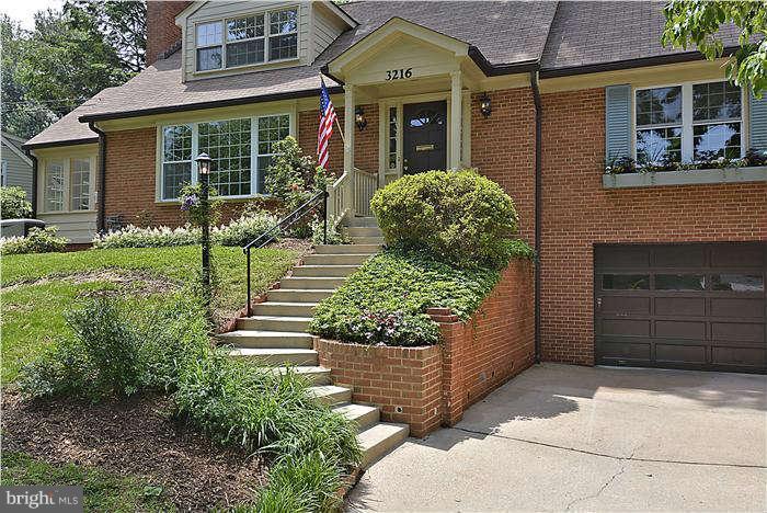 3216 Park View Road Chevy Chase, MD 20815 - Photo 2 of 29 a front view of a house with a yard