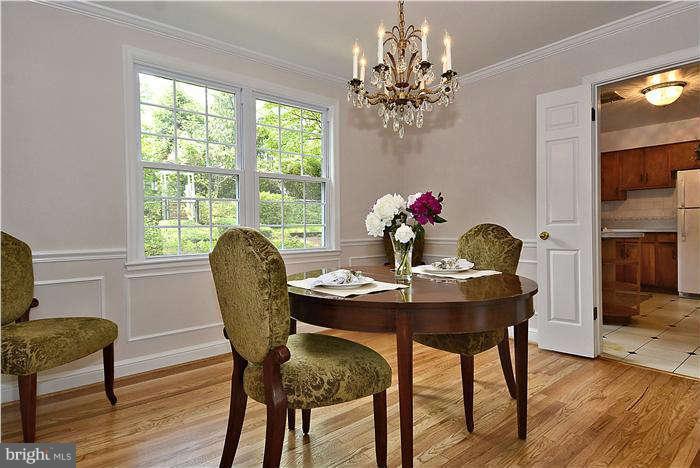 3216 Park View Road Chevy Chase, MD 20815 - Photo 11 of 29 a view of a dining room with furniture window and wooden floor