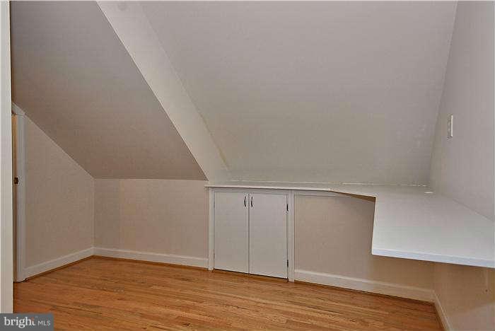3216 Park View Road Chevy Chase, MD 20815 - Photo 21 of 29 a view of an empty room with wooden floor