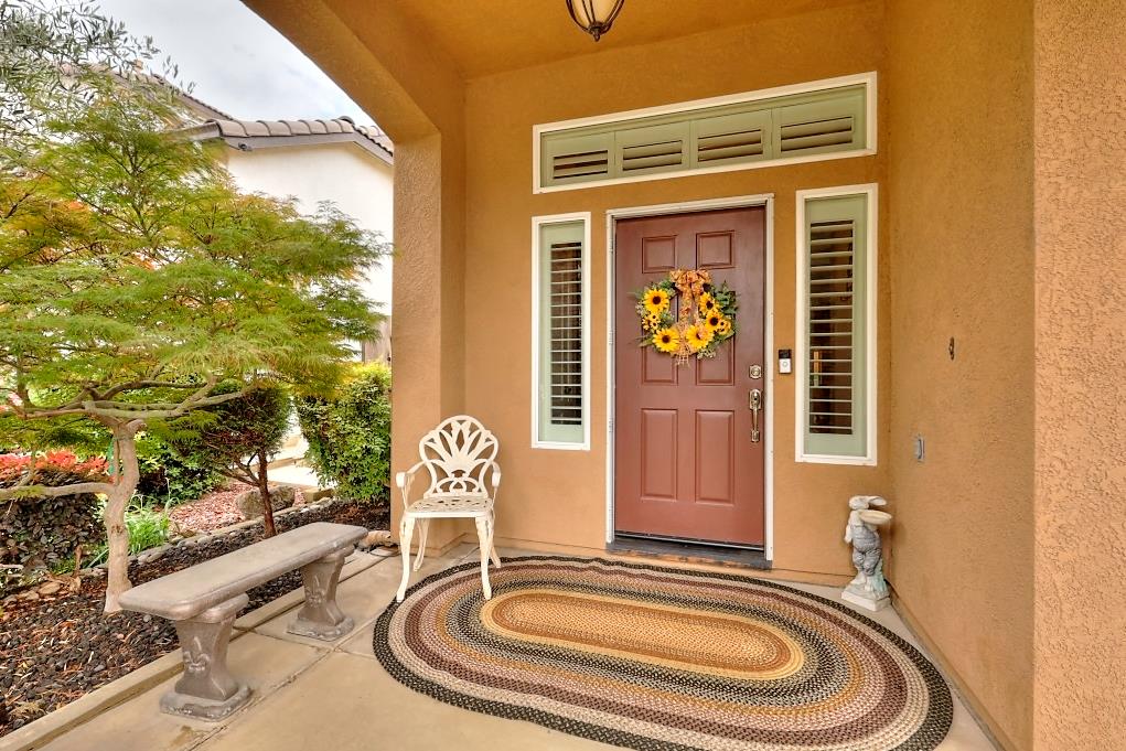 4152 Post Oak Drive Turlock, CA 95382 - Photo 9 of 71 a front view of a house with outdoor seating