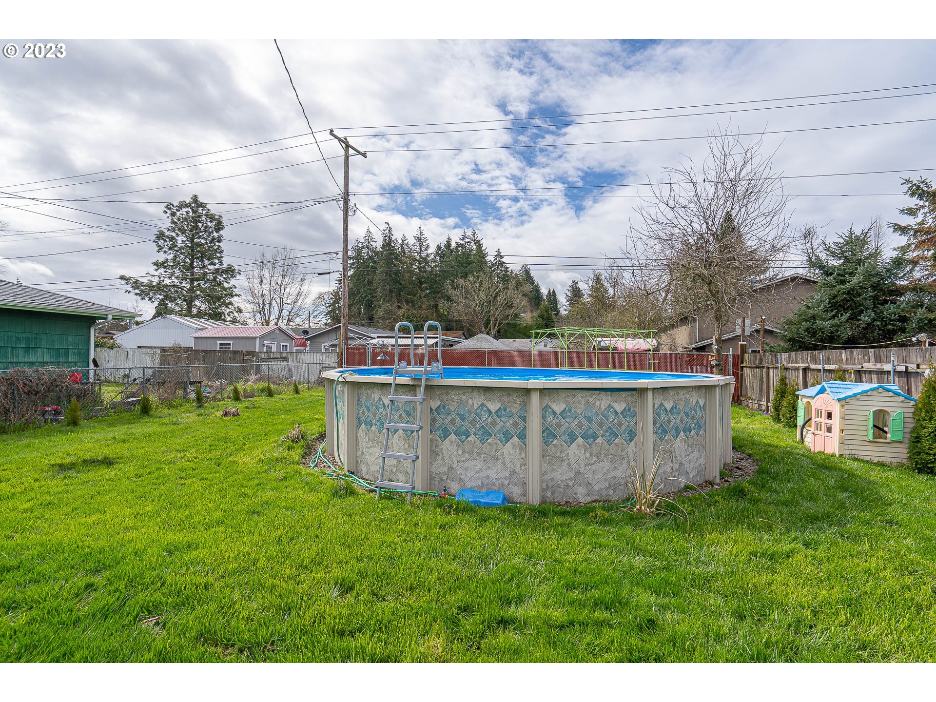 471 West M Street Springfield, OR 97477 - Photo 24 of 37 a view of outdoor space with garden and seating area