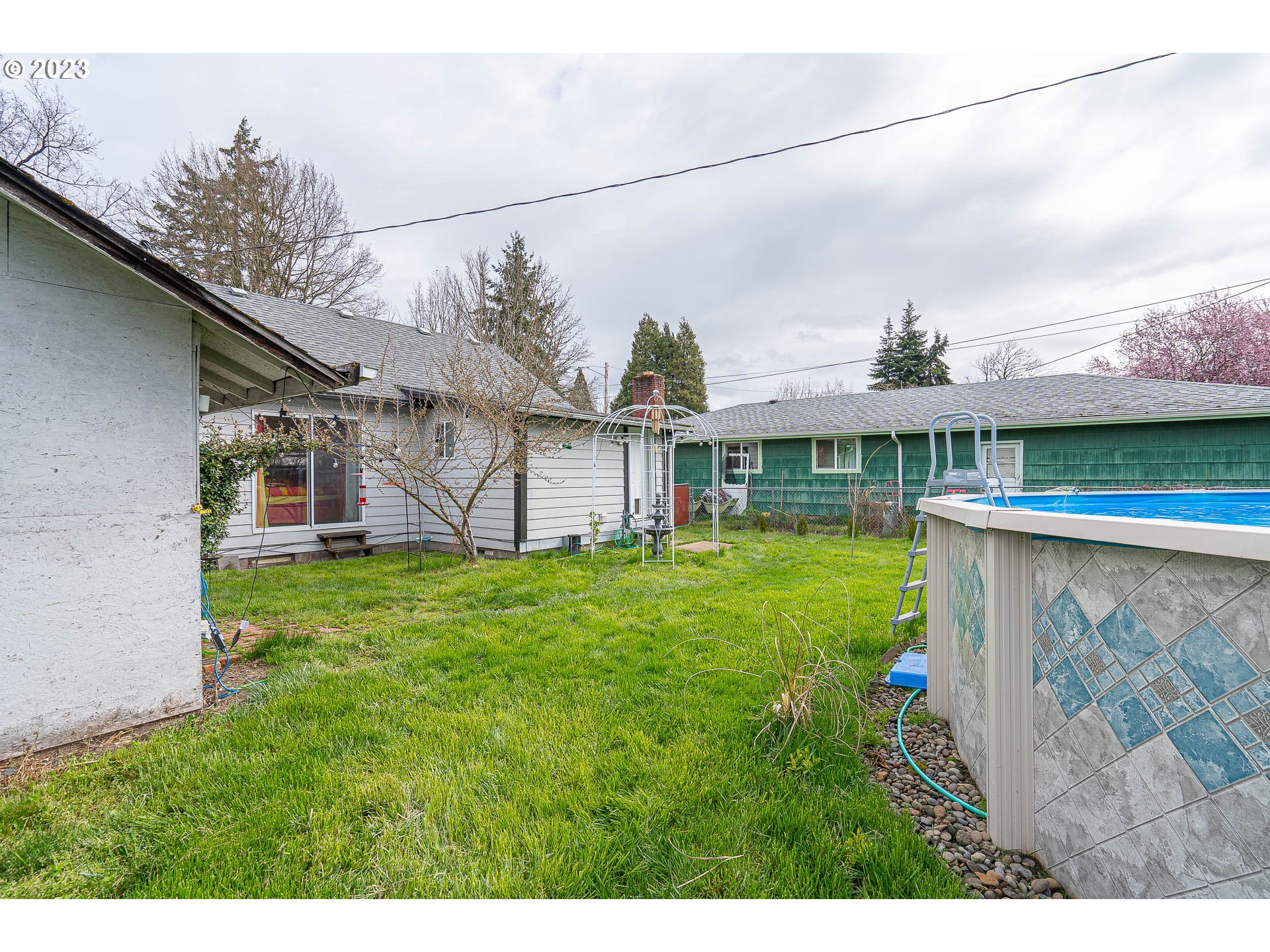 471 West M Street Springfield, OR 97477 - Photo 28 of 37 a view of a house with a yard