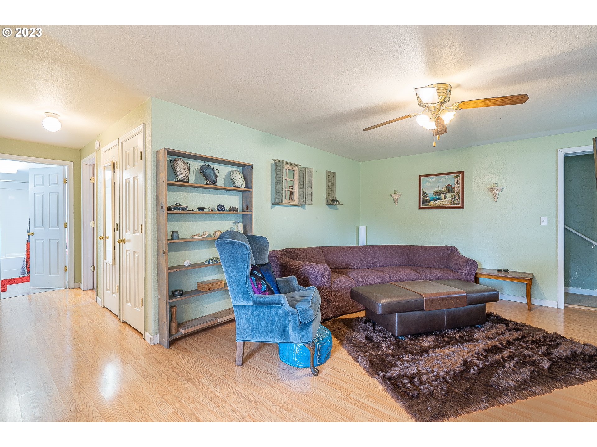 471 West M Street Springfield, OR 97477 - Photo 6 of 37 a living room with furniture and a table