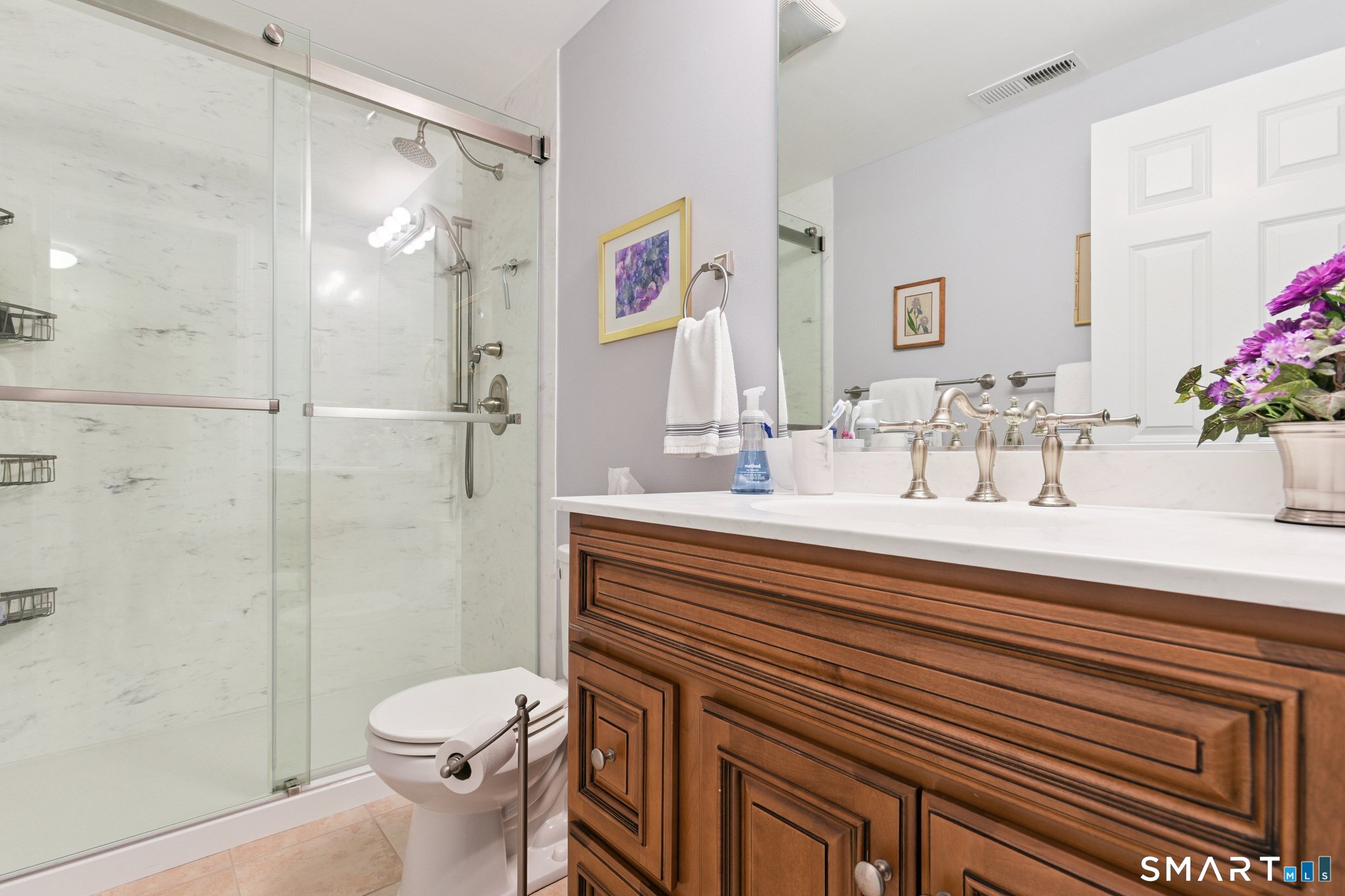 2 Bull Avenue, Unit A3 Wallingford, CT 06492 - Photo 18 of 23 a bathroom with a sink a toilet and shower