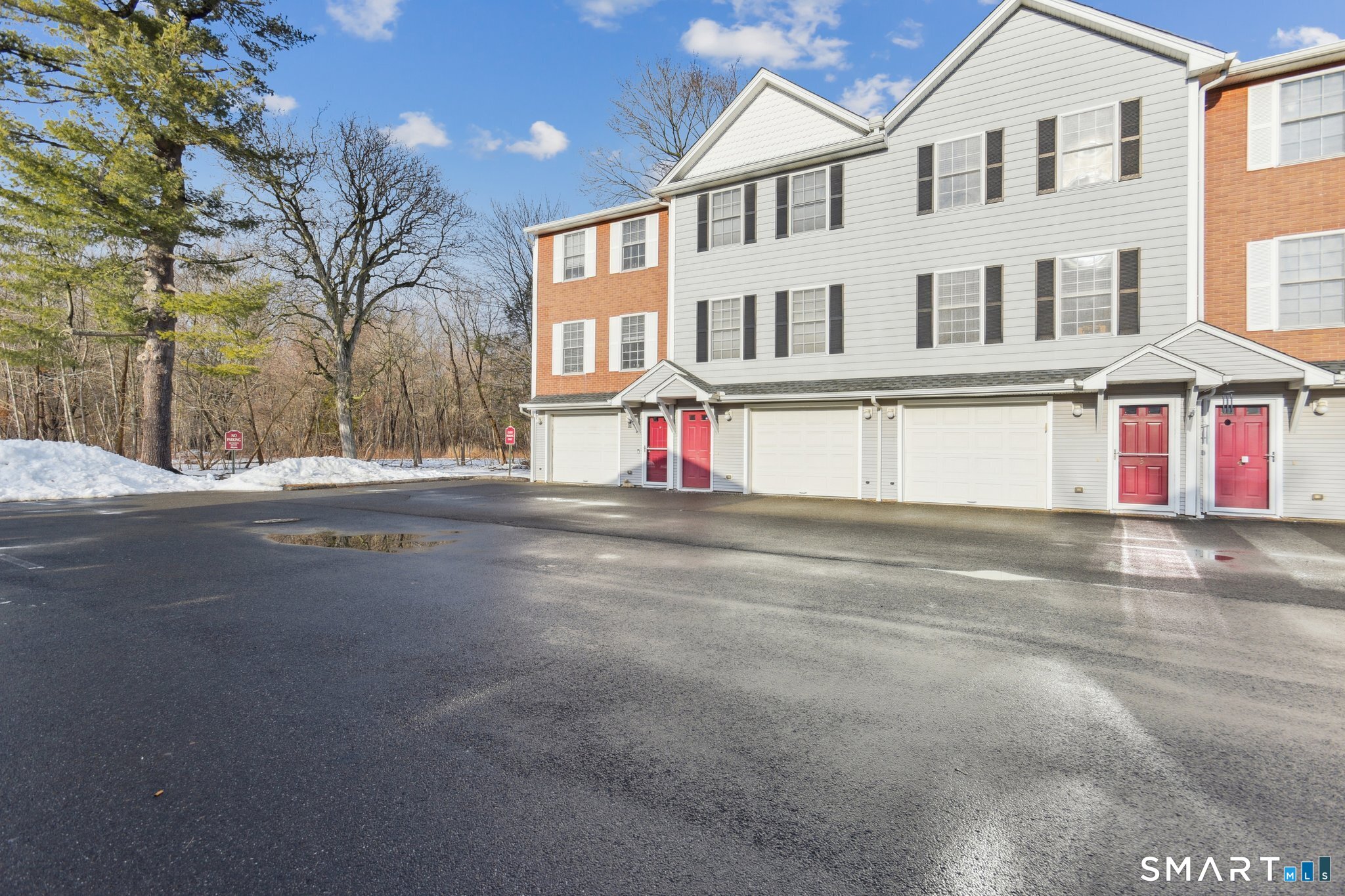 2 Bull Avenue, Unit A3 Wallingford, CT 06492 - Photo 2 of 23 a view of multiple houses with a street
