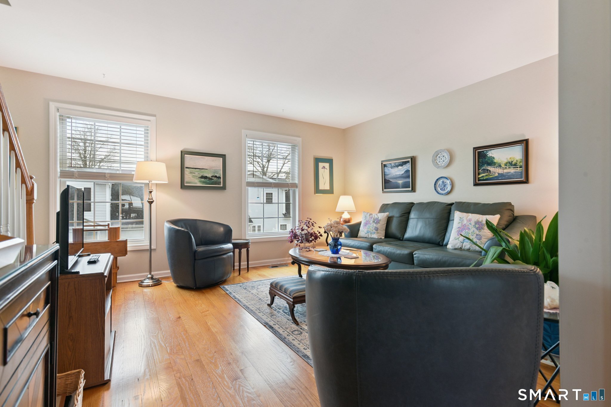 2 Bull Avenue, Unit A3 Wallingford, CT 06492 - Photo 4 of 23 a living room with furniture a fireplace and a window