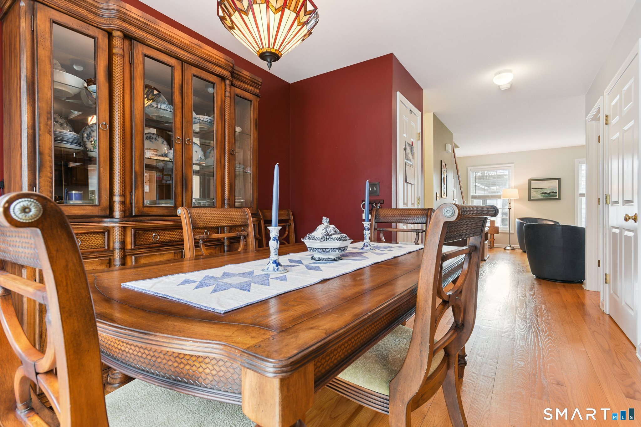 2 Bull Avenue, Unit A3 Wallingford, CT 06492 - Photo 6 of 23 a dining hall with stainless steel appliances kitchen island granite countertop a table chairs and a refrigerator