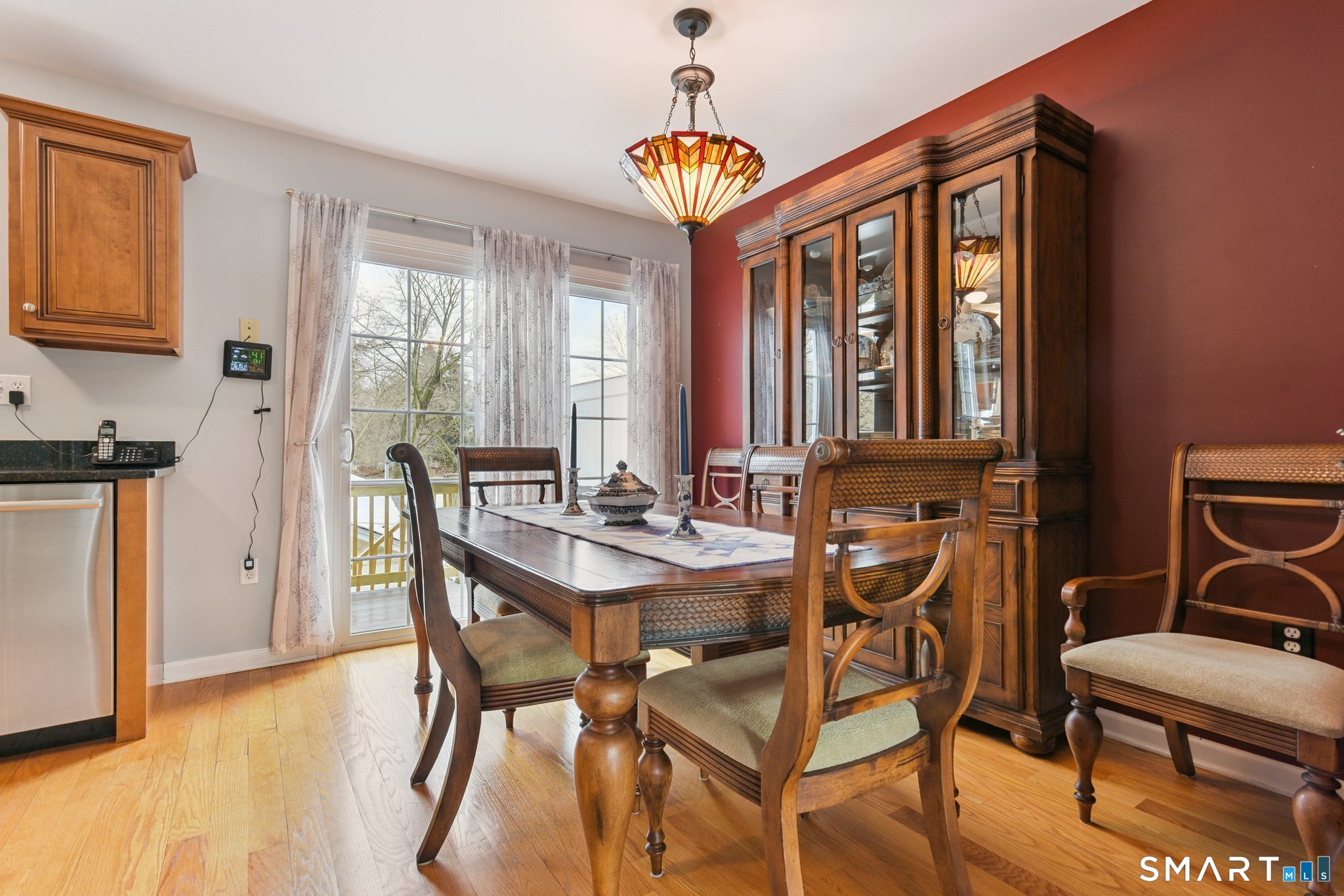 2 Bull Avenue, Unit A3 Wallingford, CT 06492 - Photo 7 of 23 a view of a dining room with furniture window and wooden floor