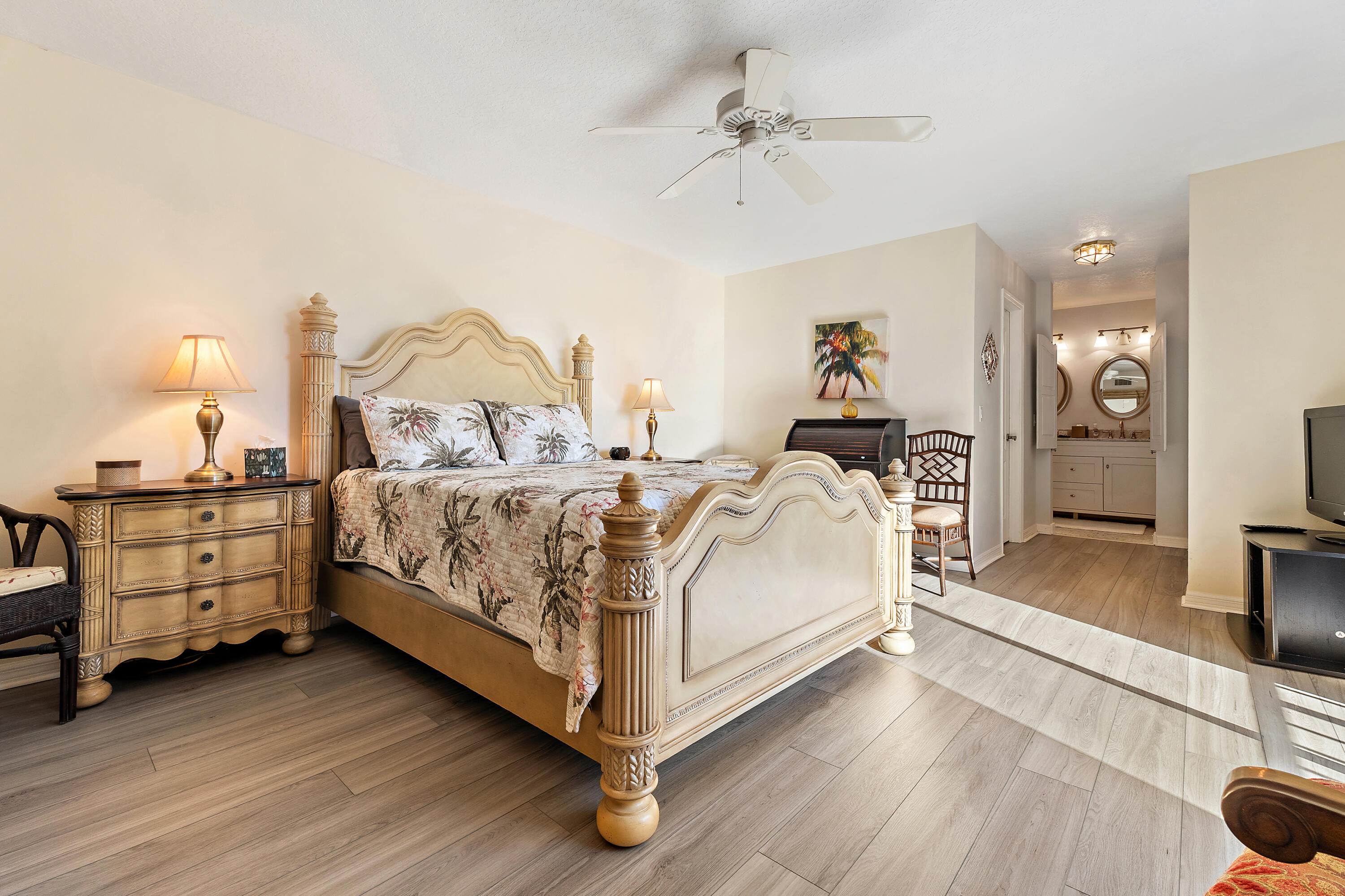 1420 Ocean Way, Unit 28D Jupiter, FL 33477 - Photo 19 of 33 a bed room with a bed and a chair